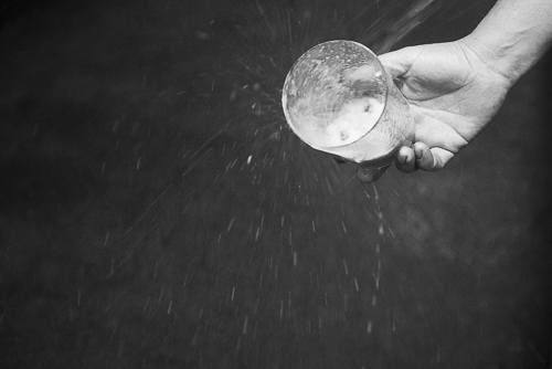 Pouring apple cider into a glass